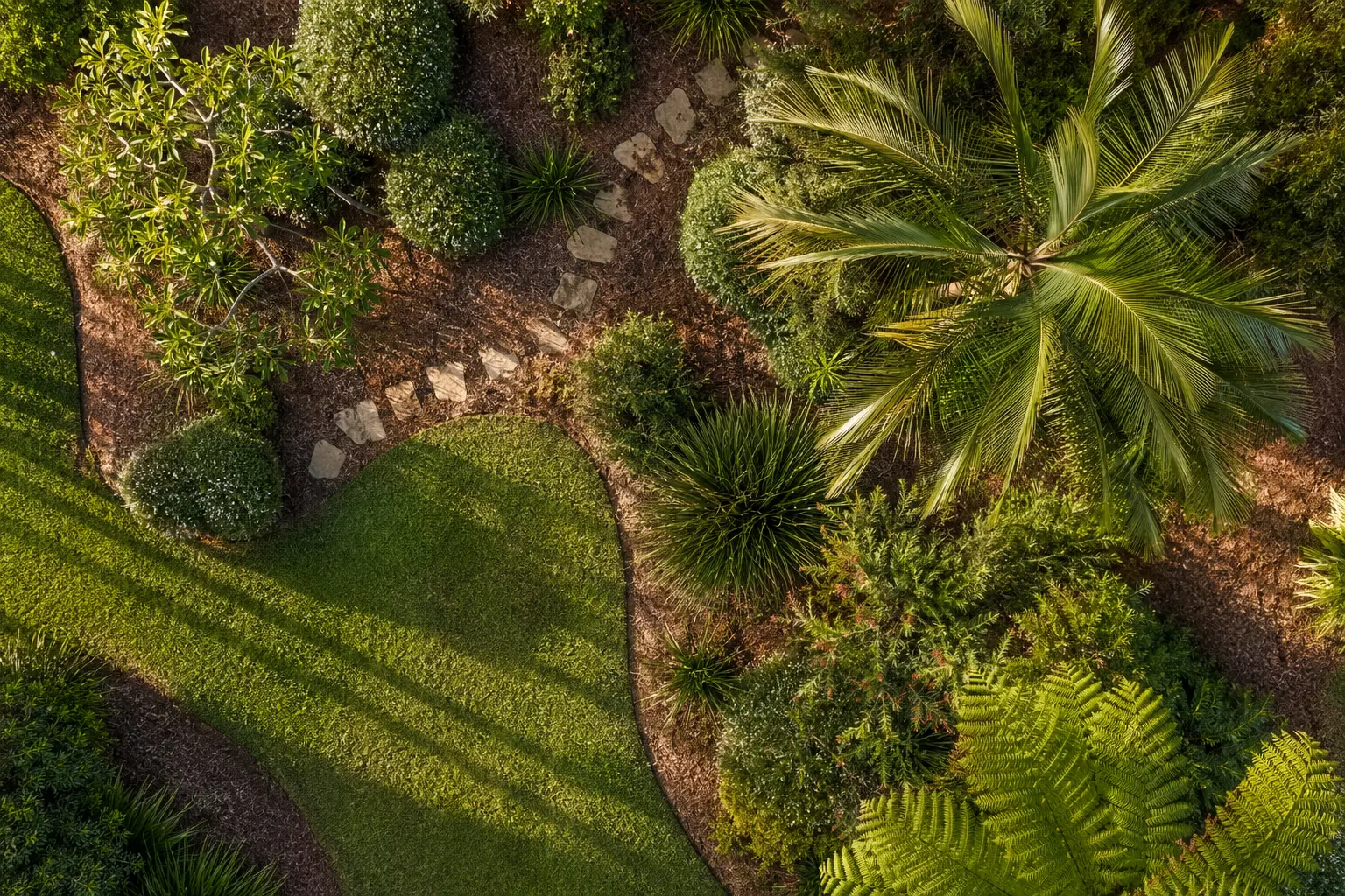 Aerial view of a freshly mulched landscaped garden in the Northern Rivers NSW